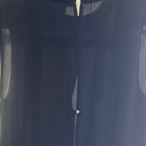 Elegant Black Sleeveless Top with Embellished Neckline - Picture 4 of 5